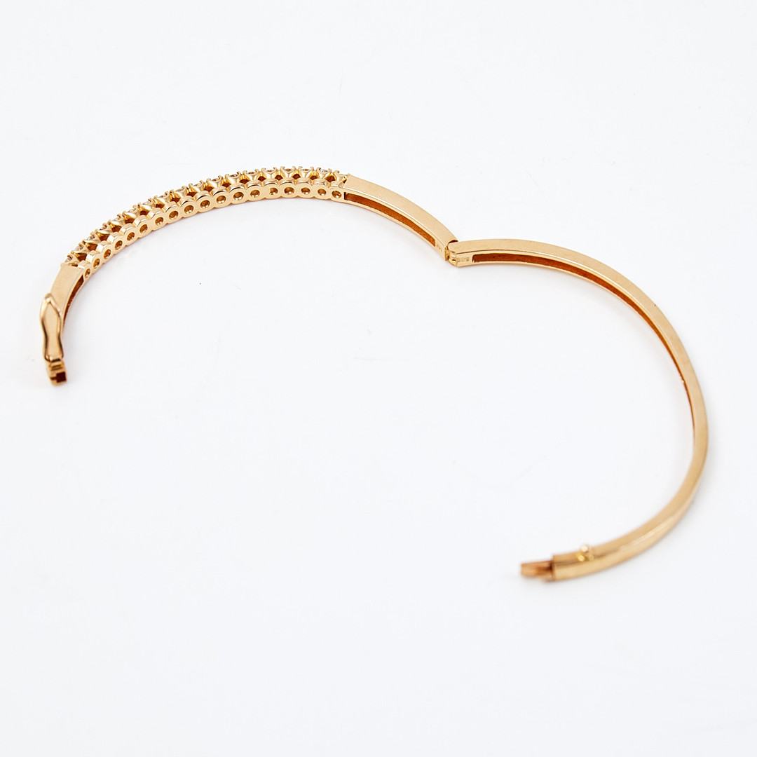 ARMBAND, stel modell, 14 k guld, med 18 st diamanter, totalt ca 1,4 ct, stämplad.