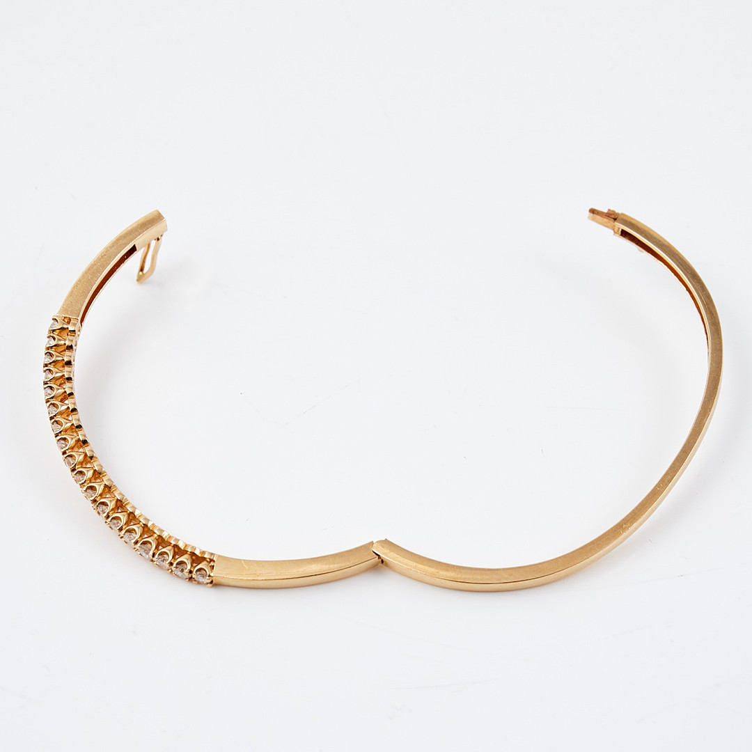 ARMBAND, stel modell, 14 k guld, med 18 st diamanter, totalt ca 1,4 ct, stämplad.