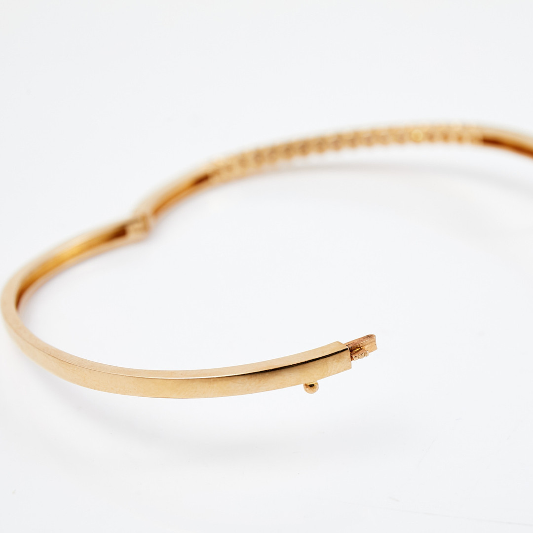 ARMBAND, stel modell, 14 k guld, med 18 st diamanter, totalt ca 1,4 ct, stämplad.