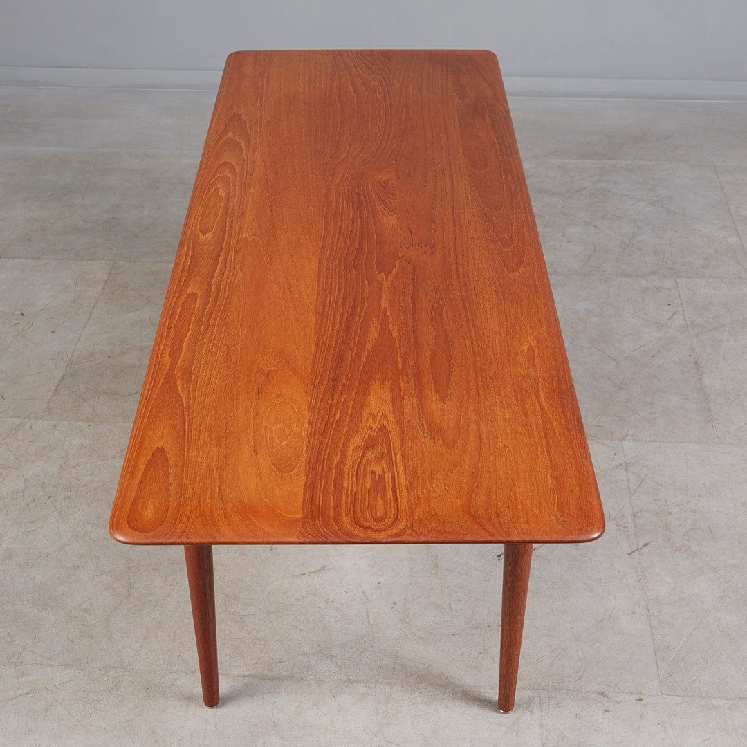 PETER HVIDT UND ORLA MOLGAARD-NIELSEN. France & Son, Couchtisch, Modell 'FD 516', Teak, Rattan, Messing, Dänemark, 1956.