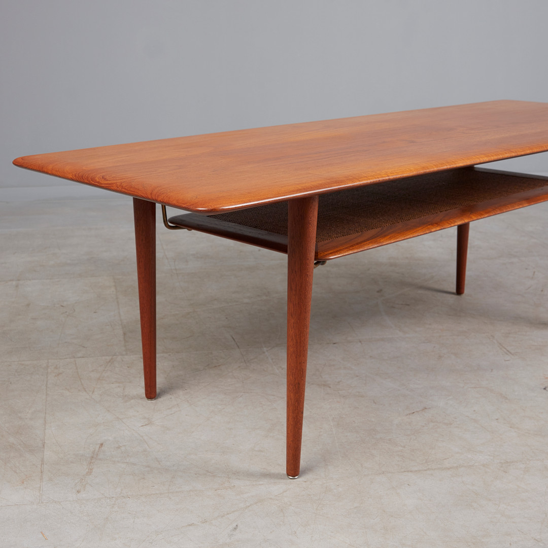 PETER HVIDT UND ORLA MOLGAARD-NIELSEN. France & Son, Couchtisch, Modell 'FD 516', Teak, Rattan, Messing, Dänemark, 1956.