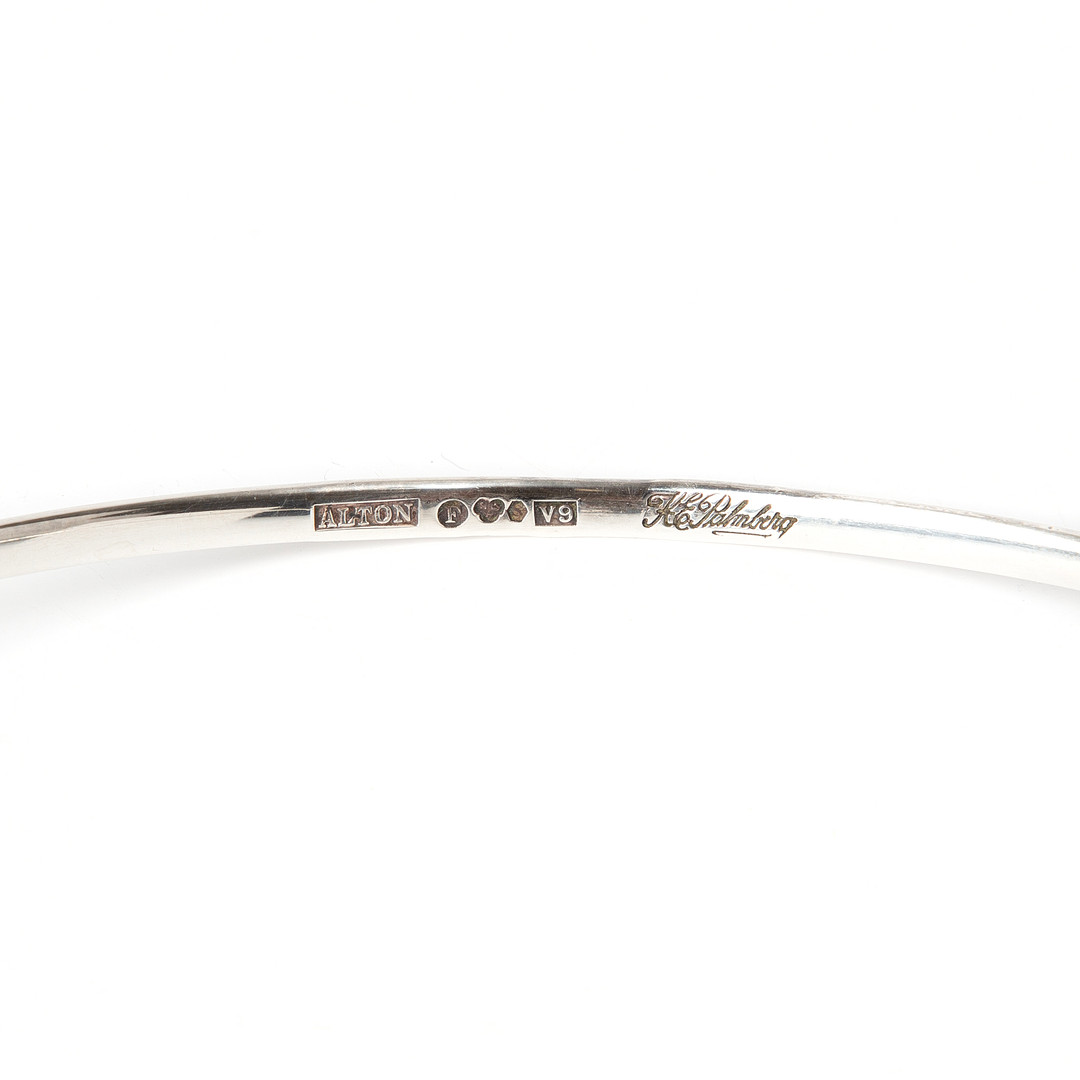 COLLIER. Silver med fasettslipad syntetisk vit spinell, Karl Erik Palmberg, Alton, 1971.