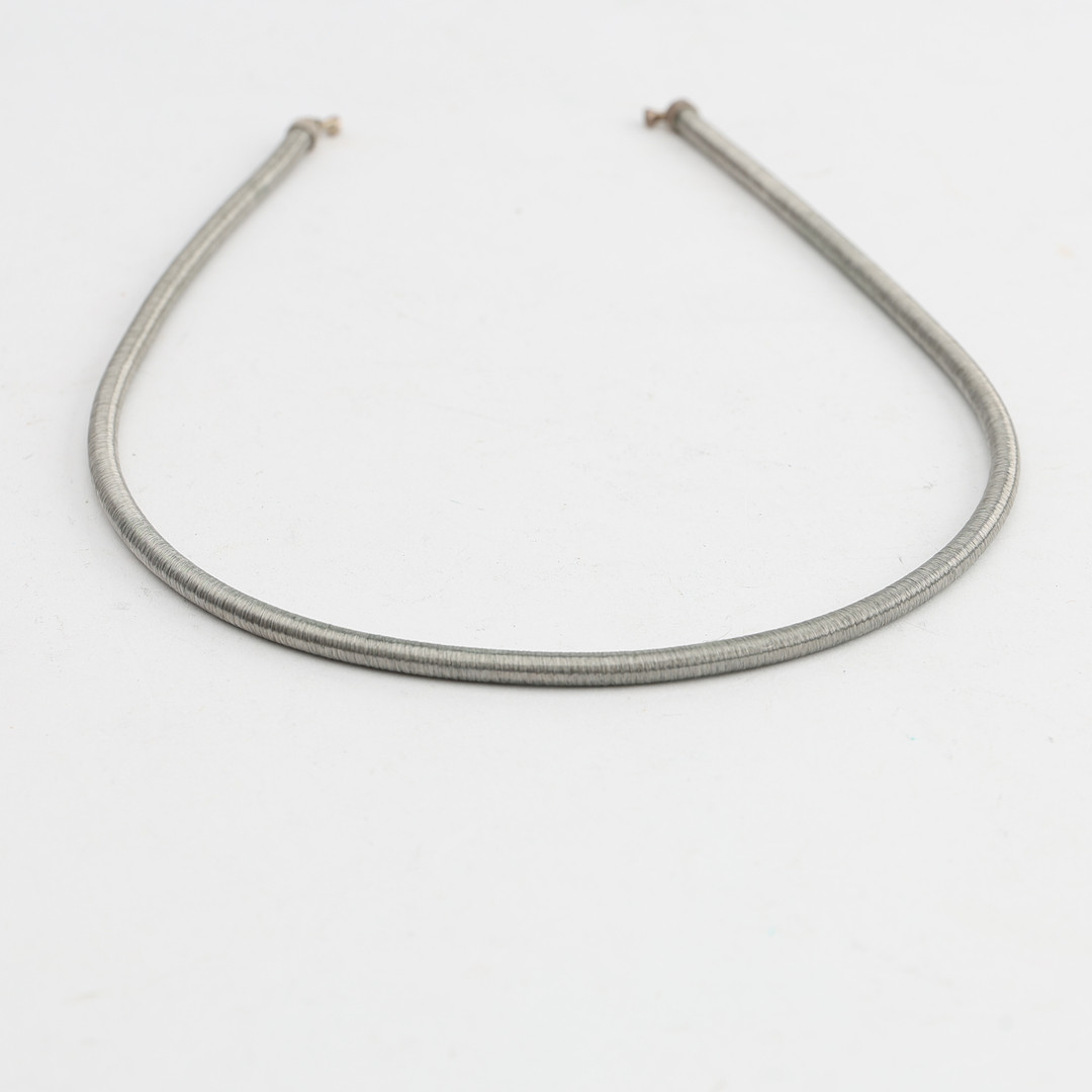 OLE LYNGGAARD. Collier, sterlingsilver, tvinnad silvertråd, med dobbar passande Ole Lynggaard lås.