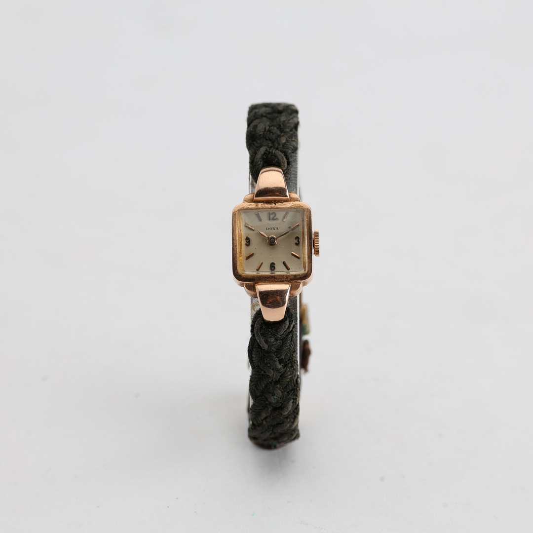 DOXA Armbandsur, 14K guld, manuell.