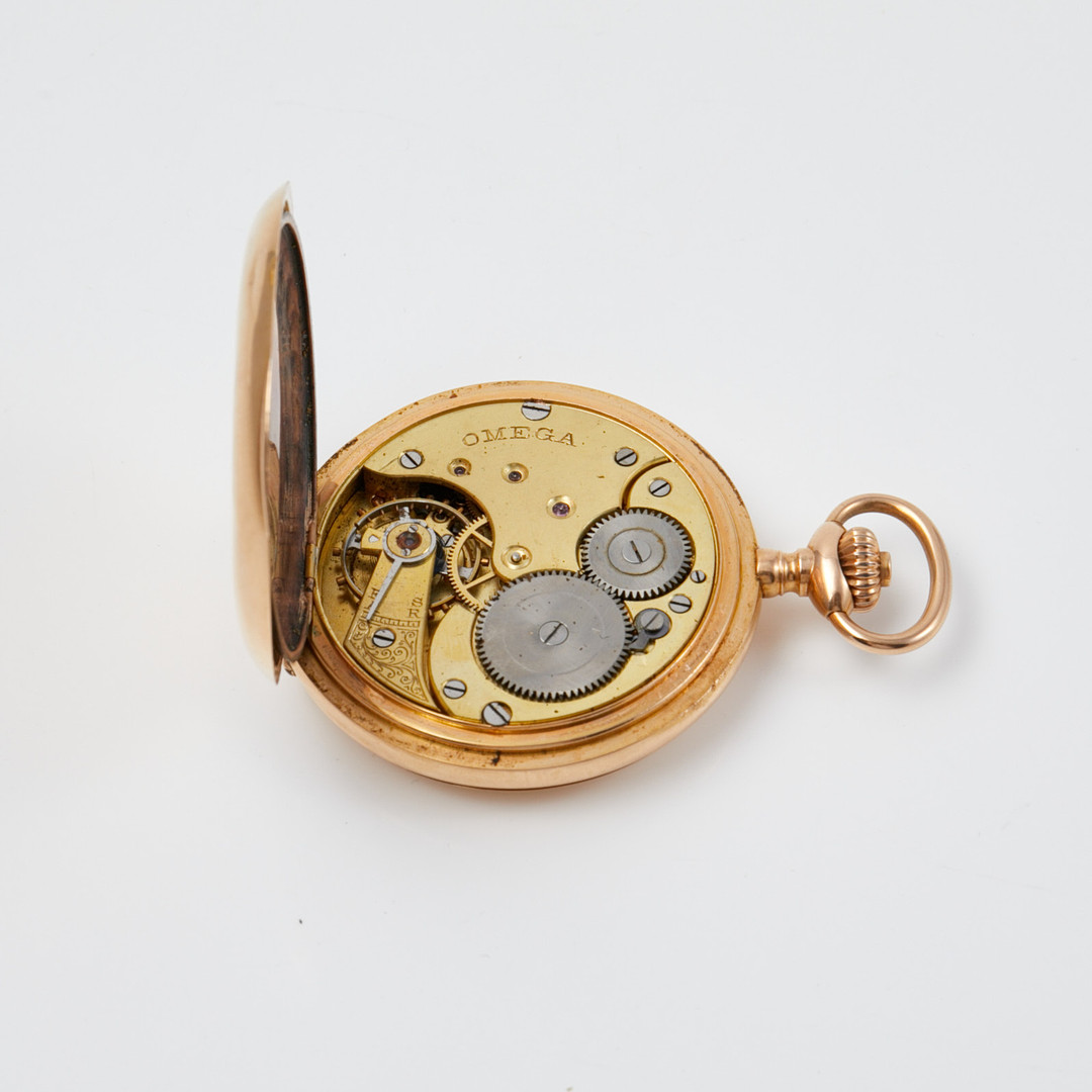 OMEGA, fickur/savonett, yttre boettlock i 18 k guld, innerboett metall, med etui.
