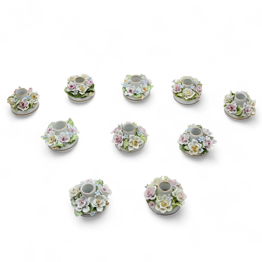 Set of ten table candle holders in porcelain from Naples, 20th Century.