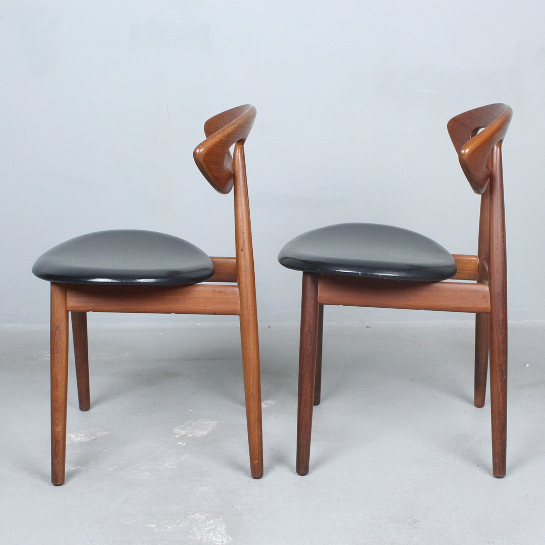 EJVIND A. JOHANSSON. Ivan Gern Møbelfabrik. Paar Stühle, Modell 'Eye Chair' / '84', Teak, Dänemark, 1960er Jahre.