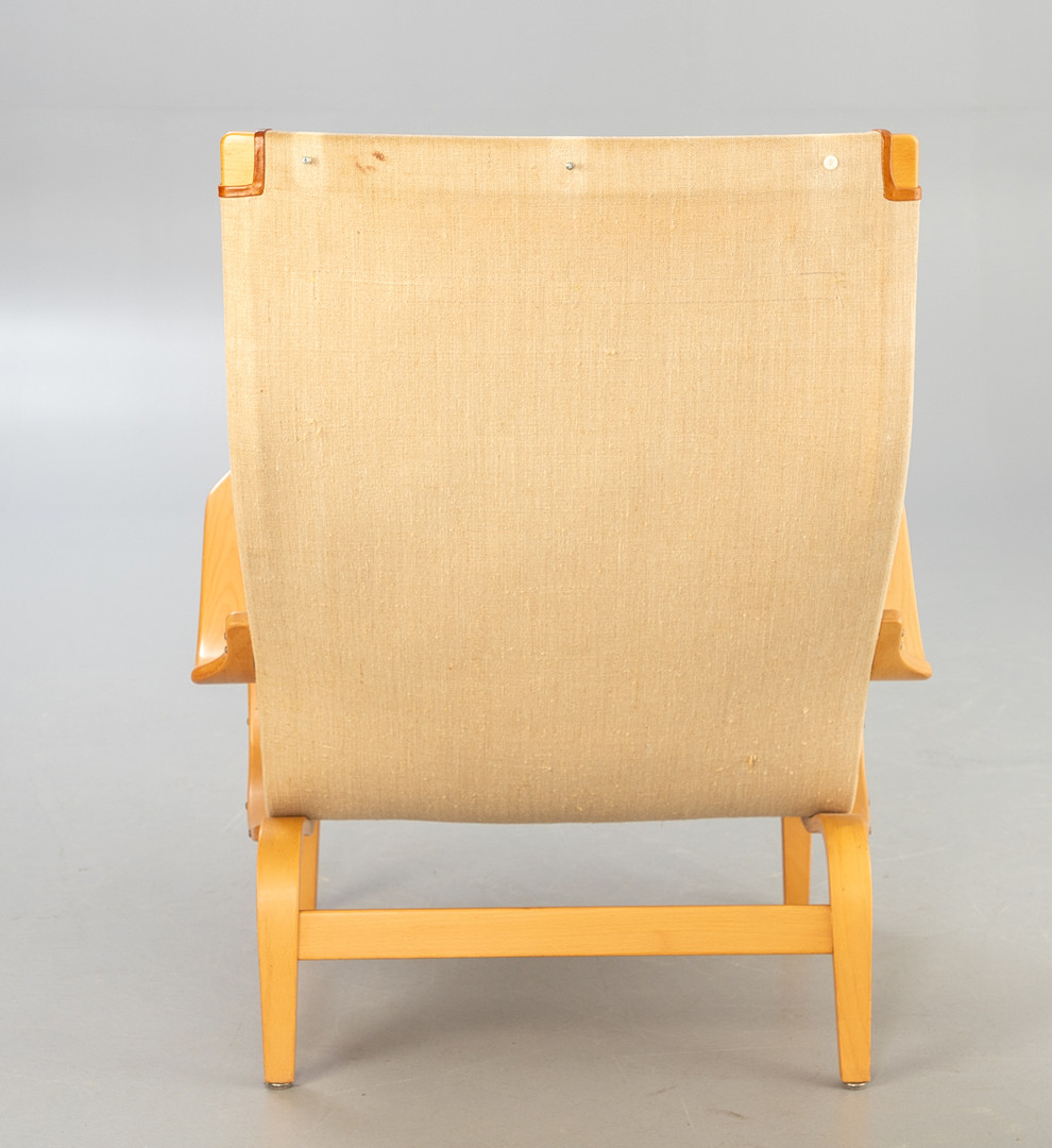 BRUNO MATTHSON. Dux. Sessel mit Hocker,