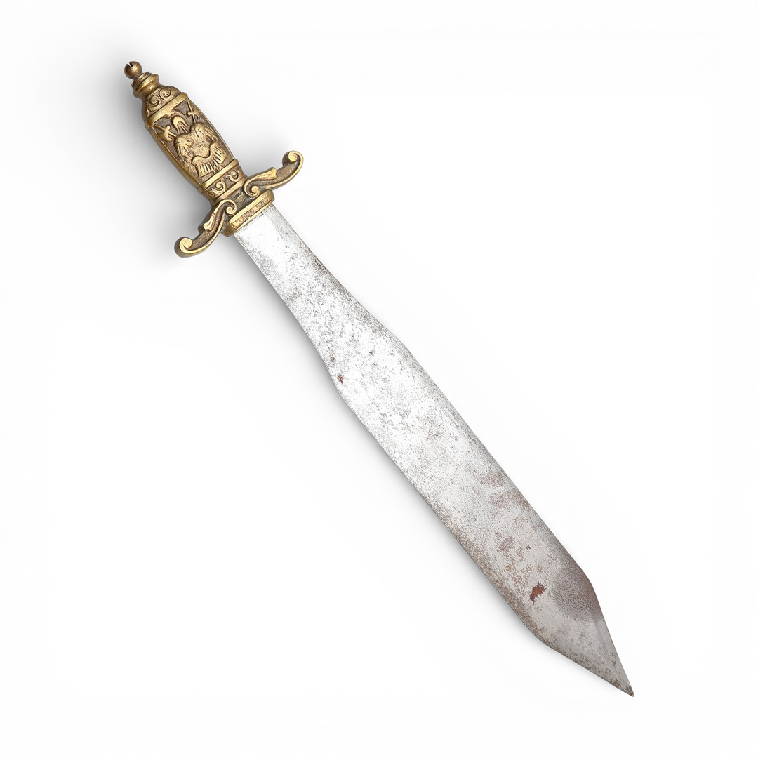Machete with brass handle.