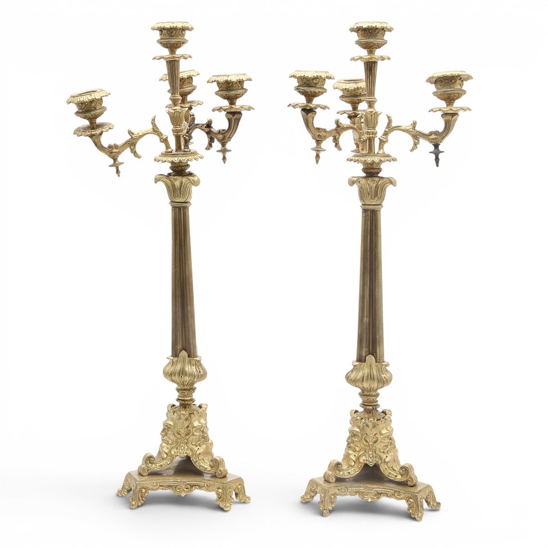 Pair of Louis XVI style candelabra in gilt bronze, 20th Century.