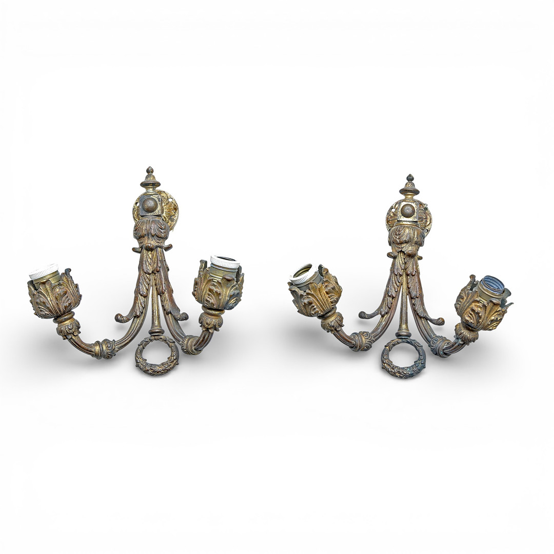 Pair of Louis XVI style wall lamps in gilt bronze, 19th Century.