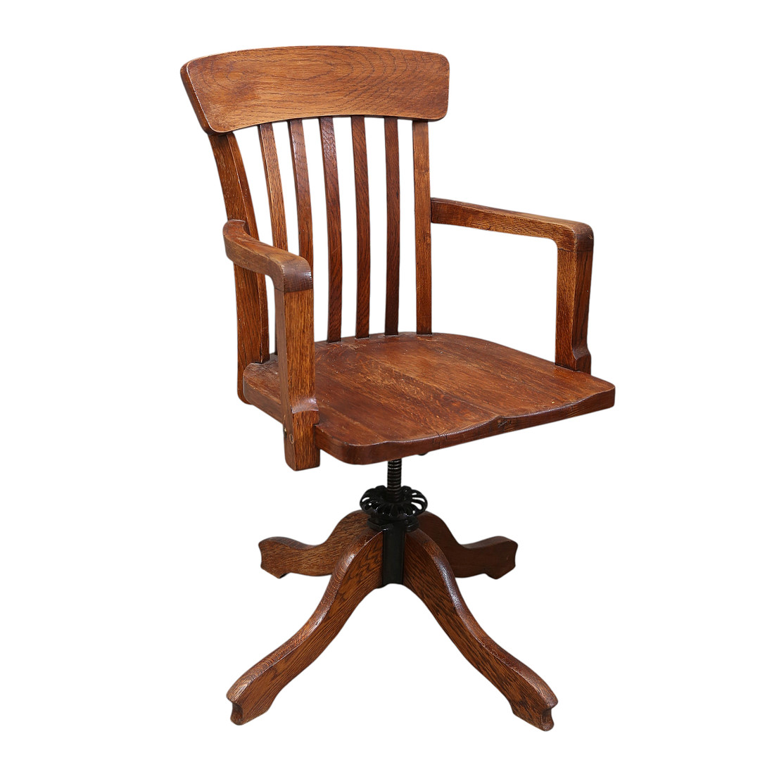 Swivel desk's chair in oak, early 20th Century.