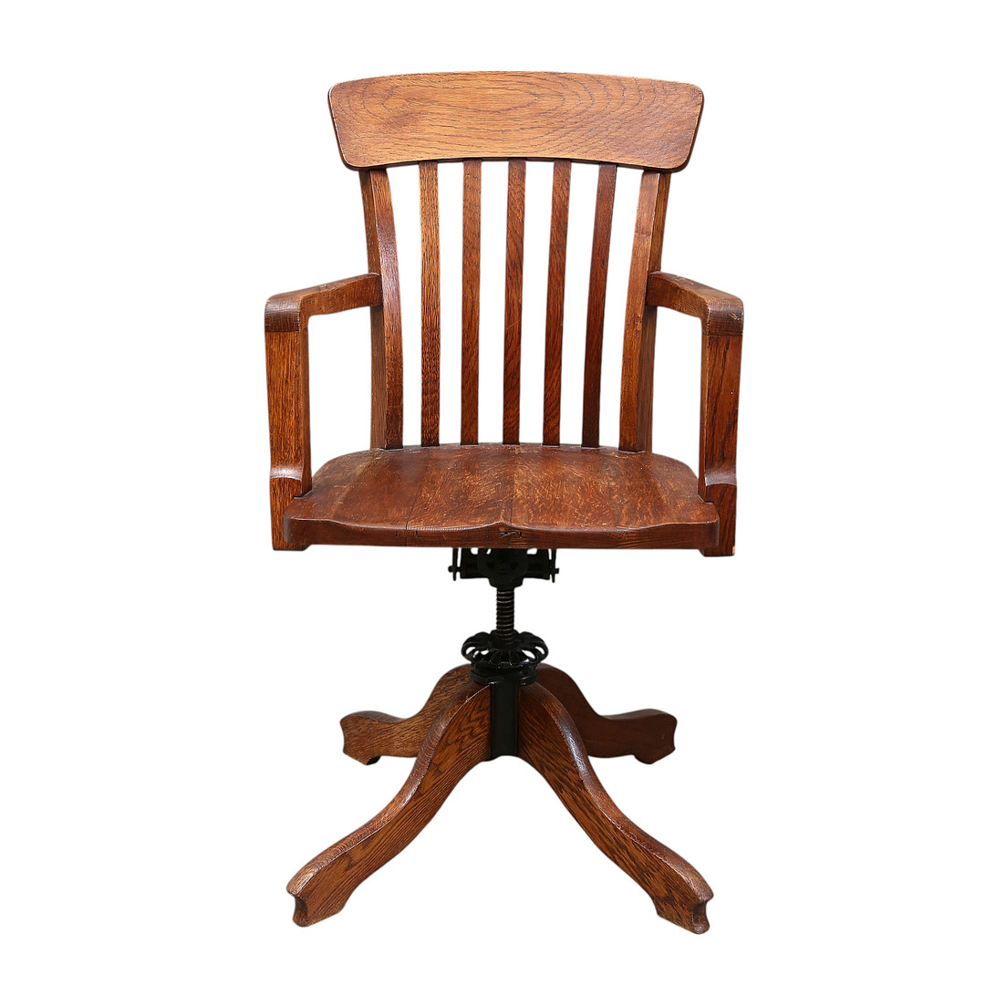 Swivel desk's chair in oak, early 20th Century.