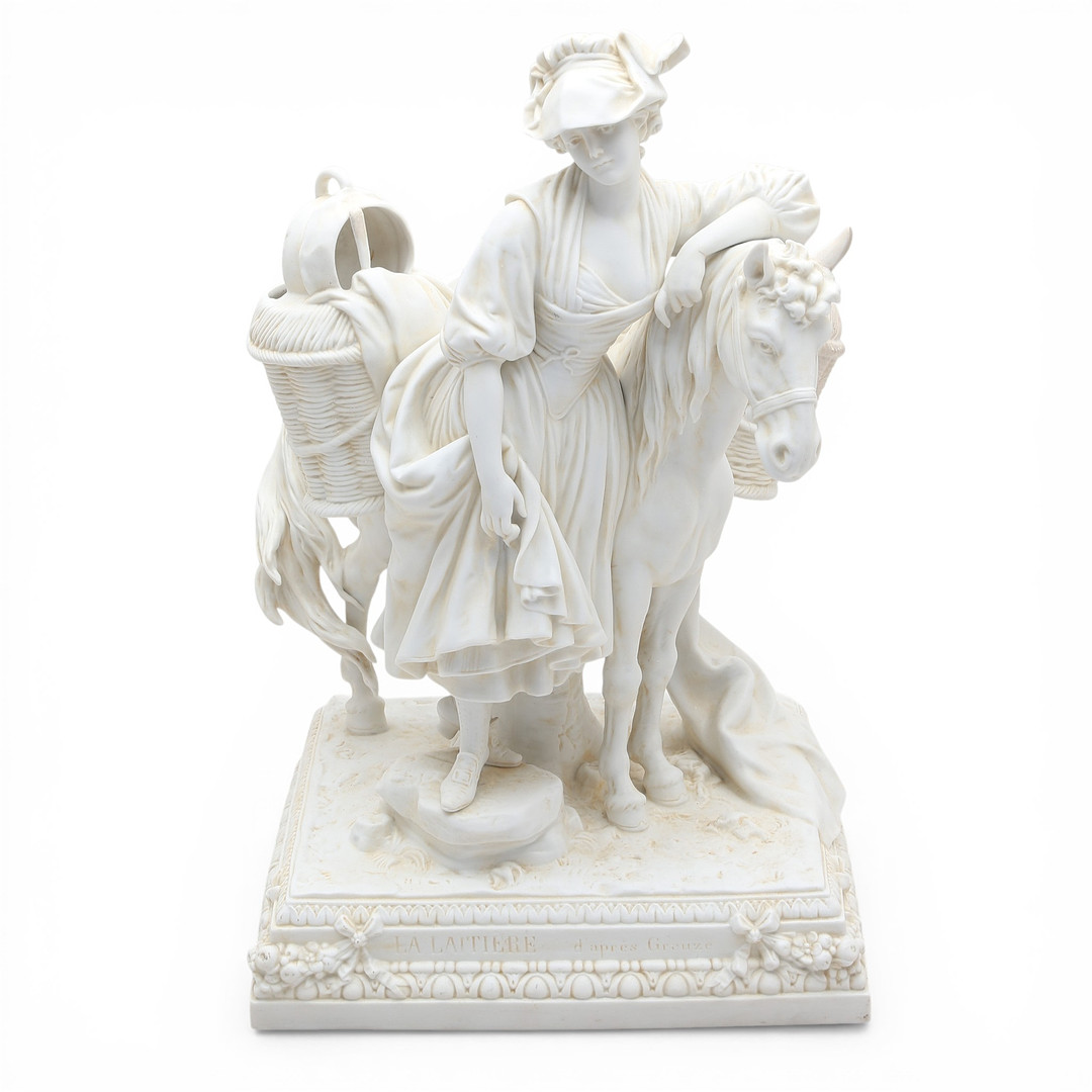 “La Laitière”, German figural group in biscuit from Scheibe-Alsbach, early 20th Century.