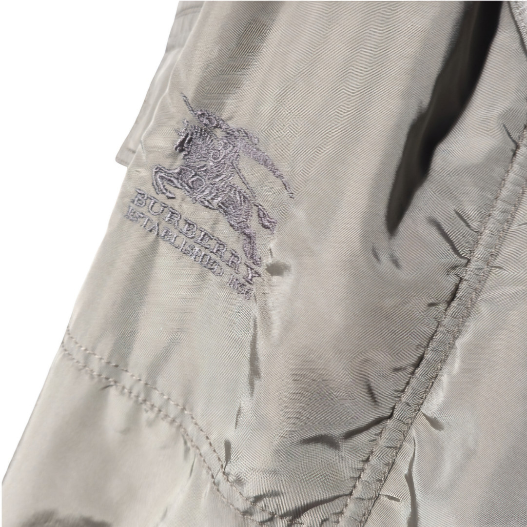 BURBERRY. Parka de hombre color kaki. Talla 8 de la casa.