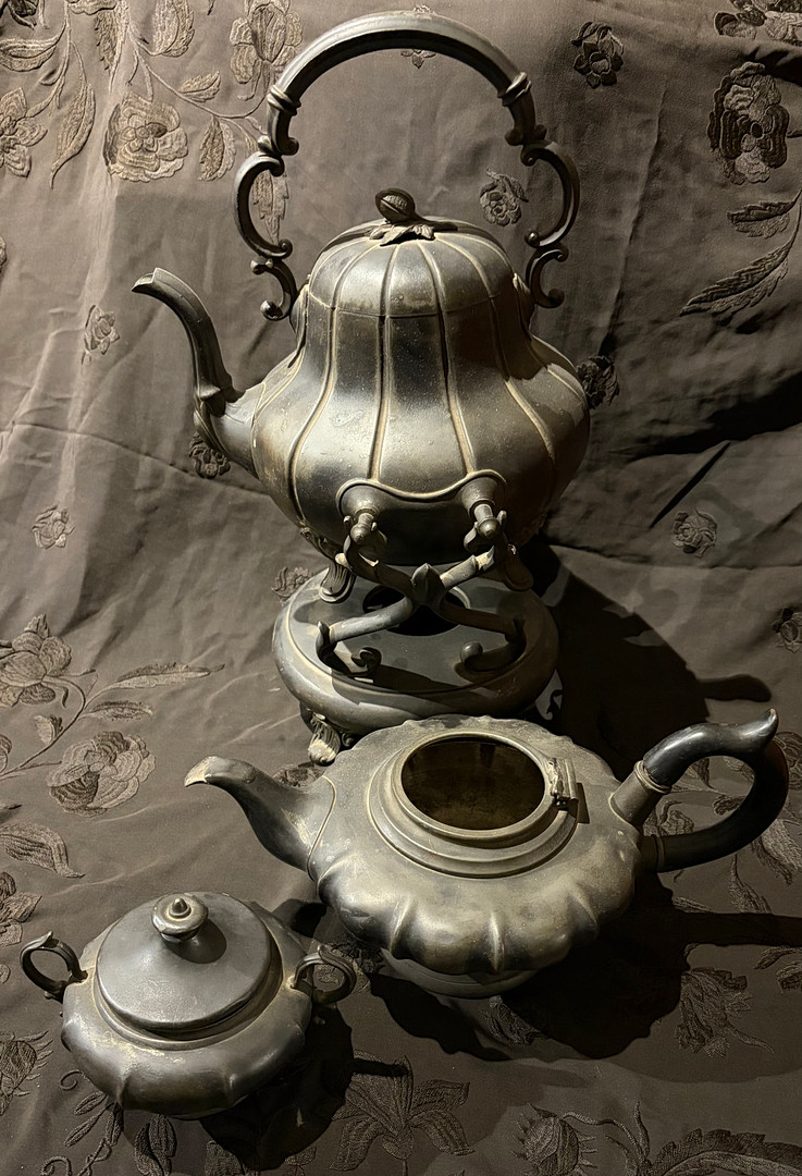 Sheffield tin tea and coffee set, from the late 19th century.