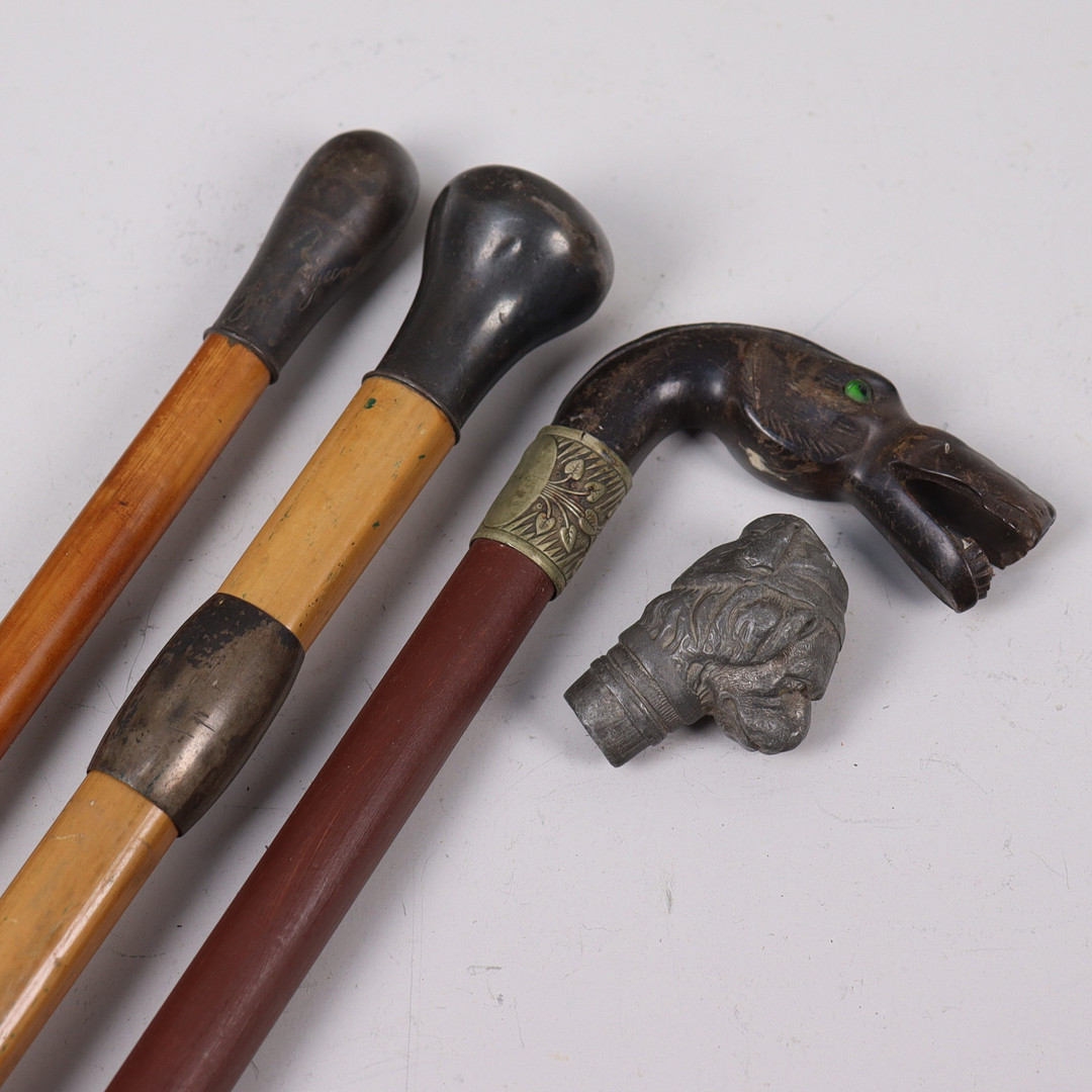 KÄPPAR, 3 st samt käpphandtag, ben, silver och metall, 4 delar.