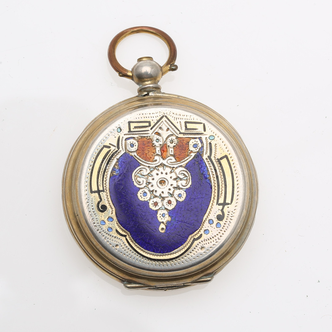 Pocket watch case in silvery metal and enamel, mid 19th Century.