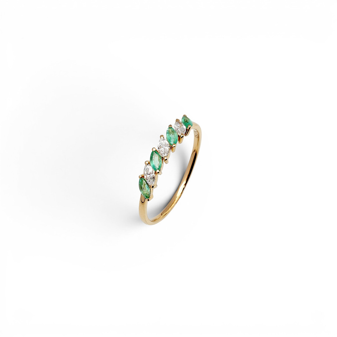 Diamonds and emeralds ring.