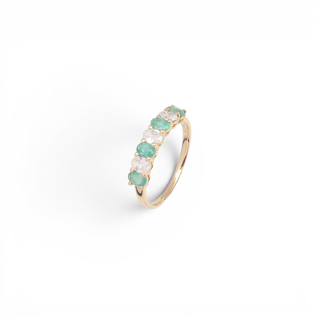 Diamonds and emeralds ring.