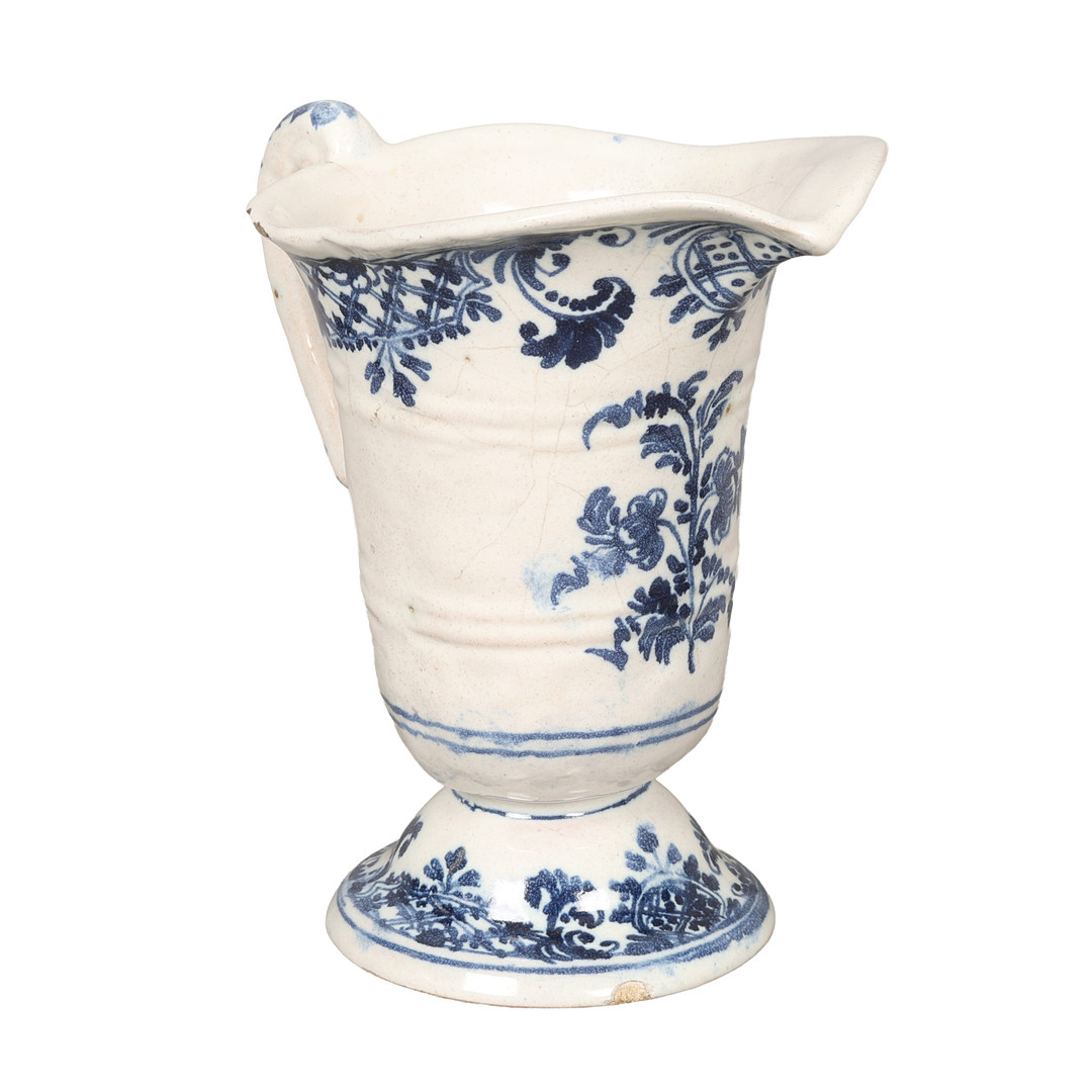 AN 18TH CENTURY MOUSTIER HELMET JUG.