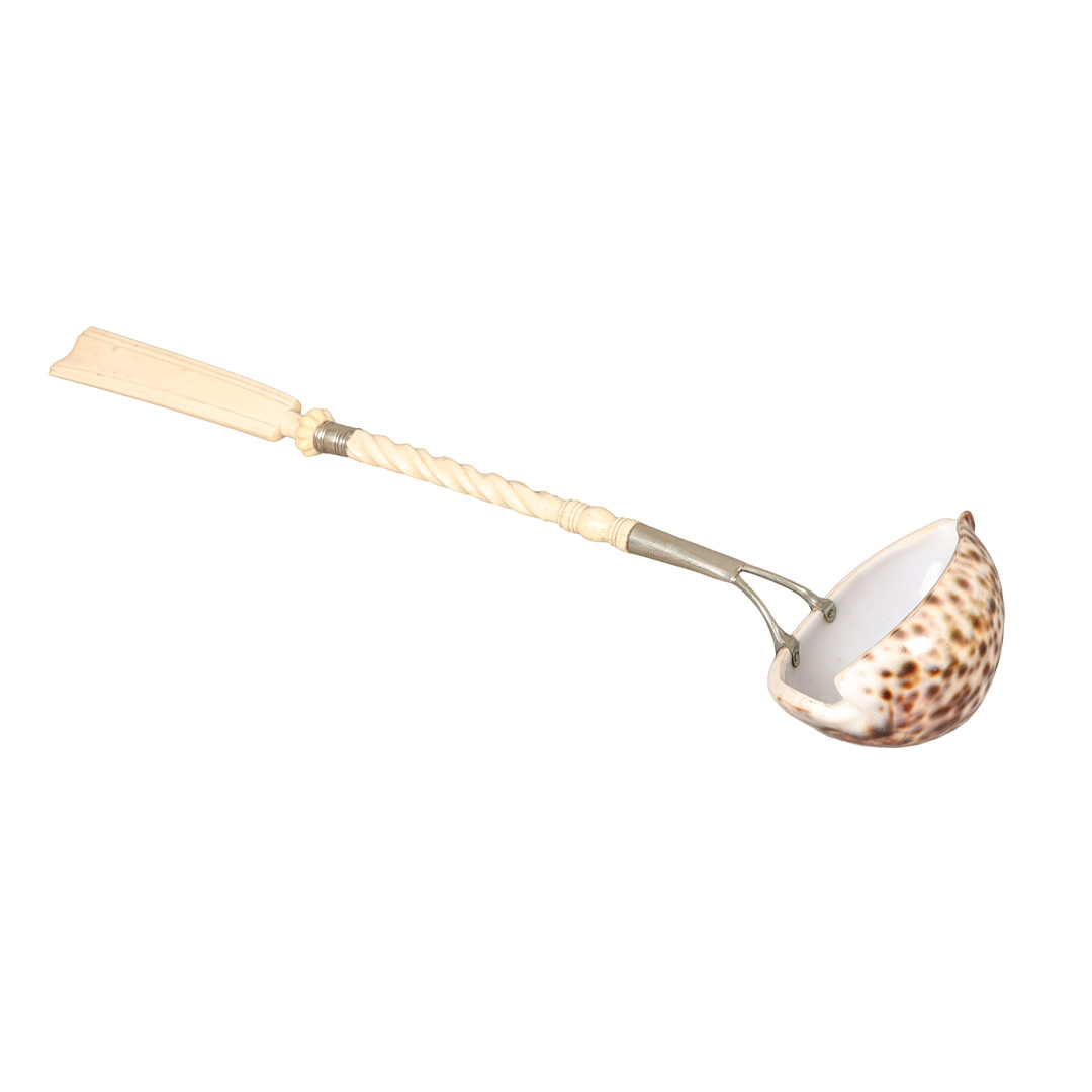 A COWRIE SHELL AND BONE LADLE, 20TH CENTURY.