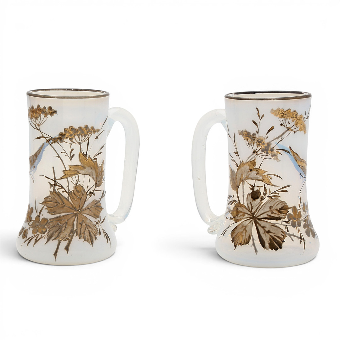 Pair of opalescent glass cups with gilt decoration, 19th Century.