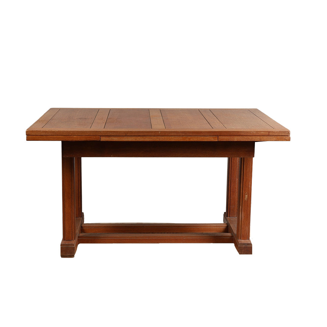 A GORDON RUSSELL OAK DRAW-LEAF DINING TABLE.