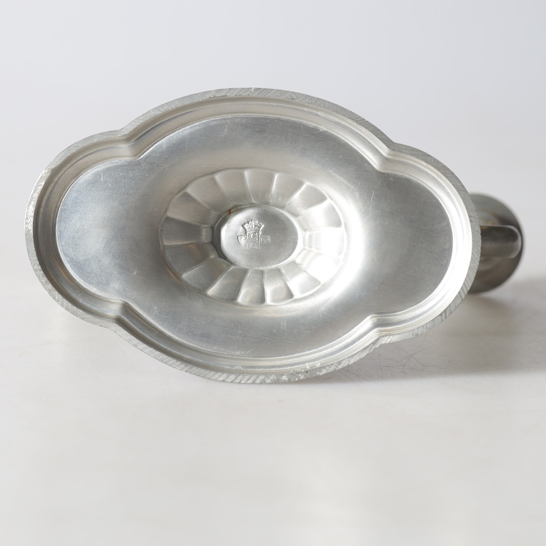 KANDELABRAR, 1 par, tenn, C.G. Hallberg, Stockholm, 1939.