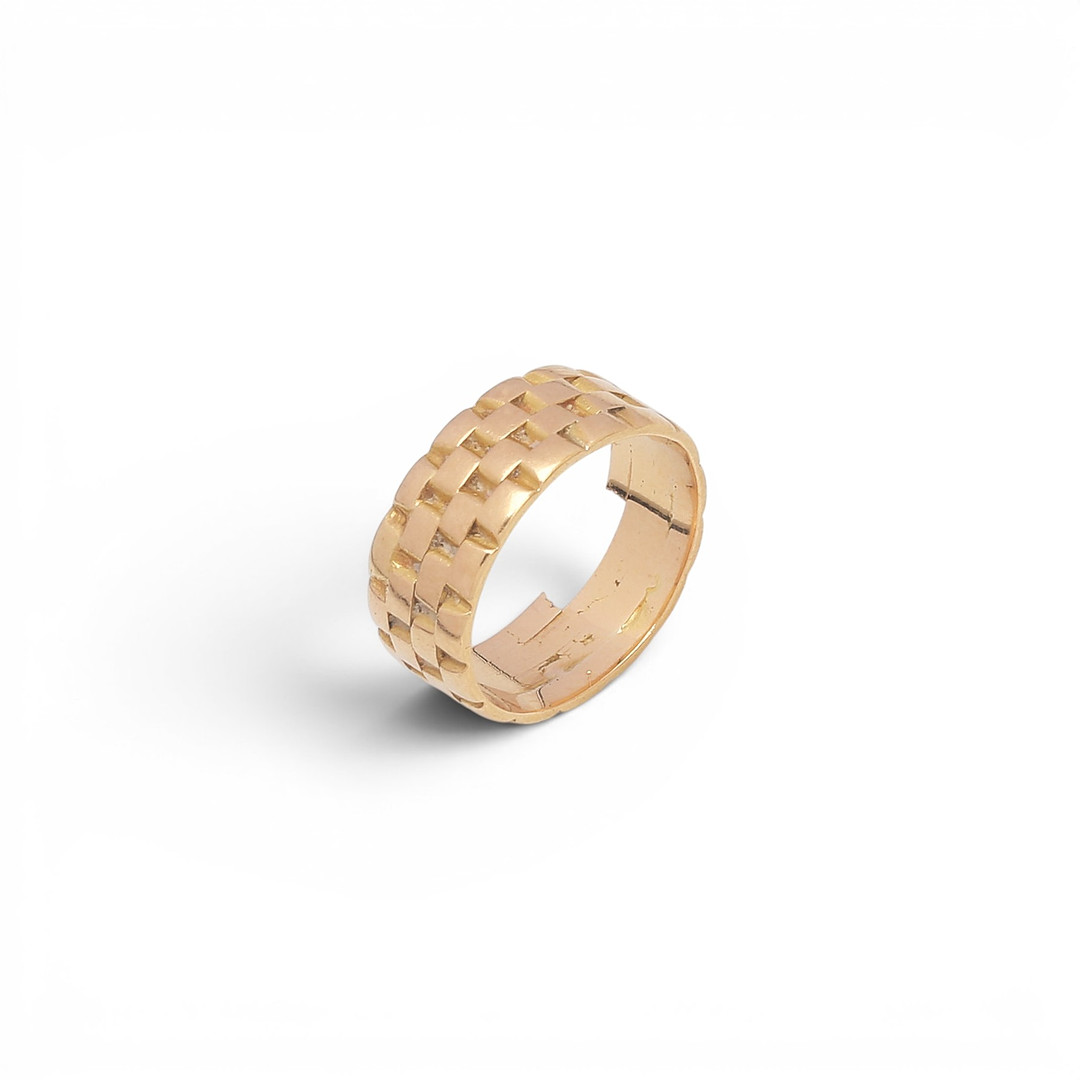 Wide gold ring.