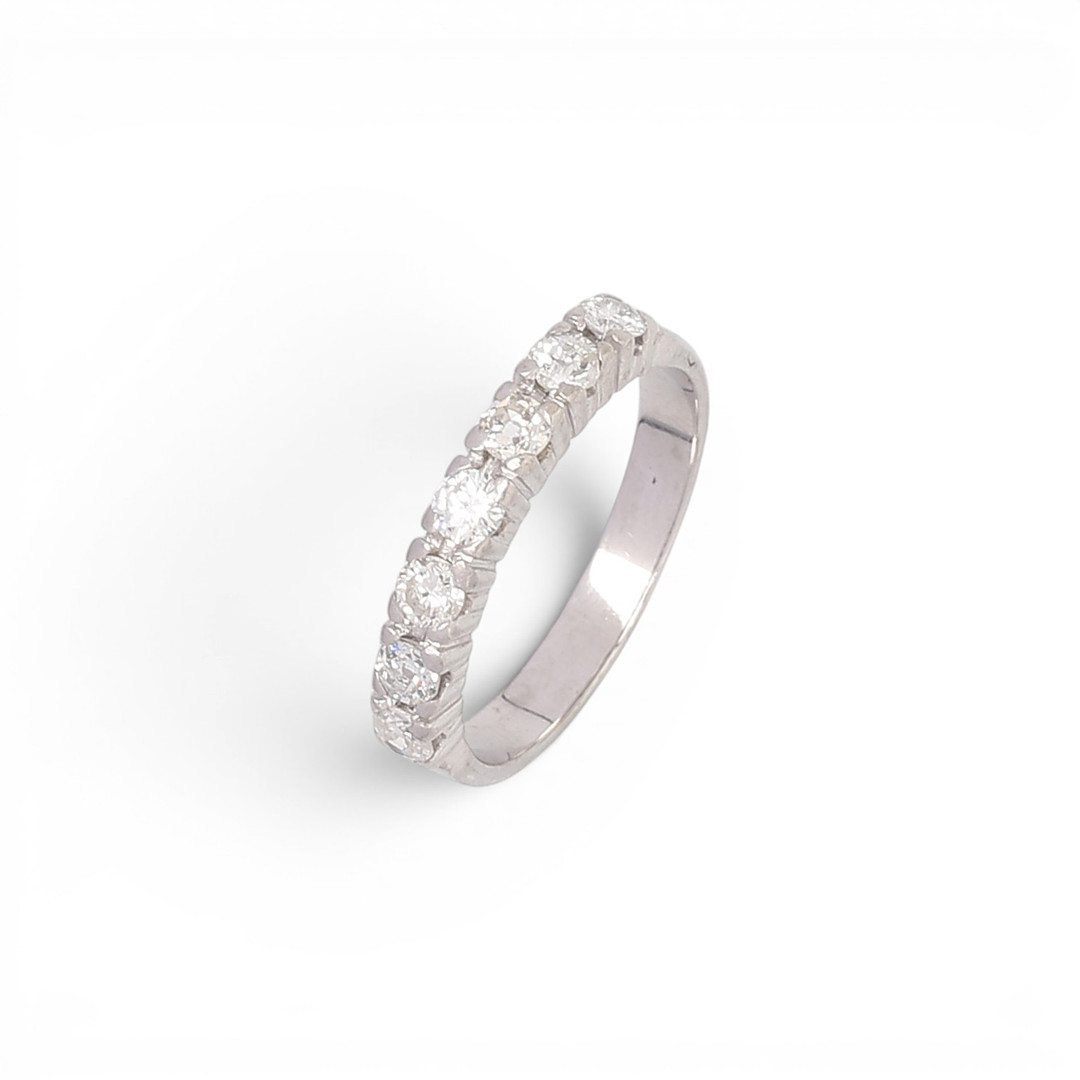 Half-band diamonds wedding ring.