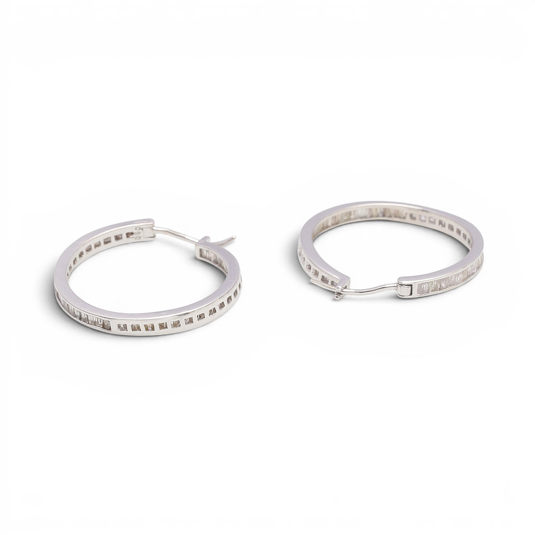 Diamonds creole earrings.