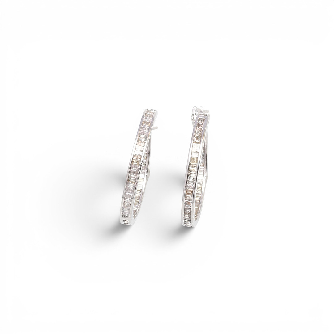 Diamonds creole earrings.