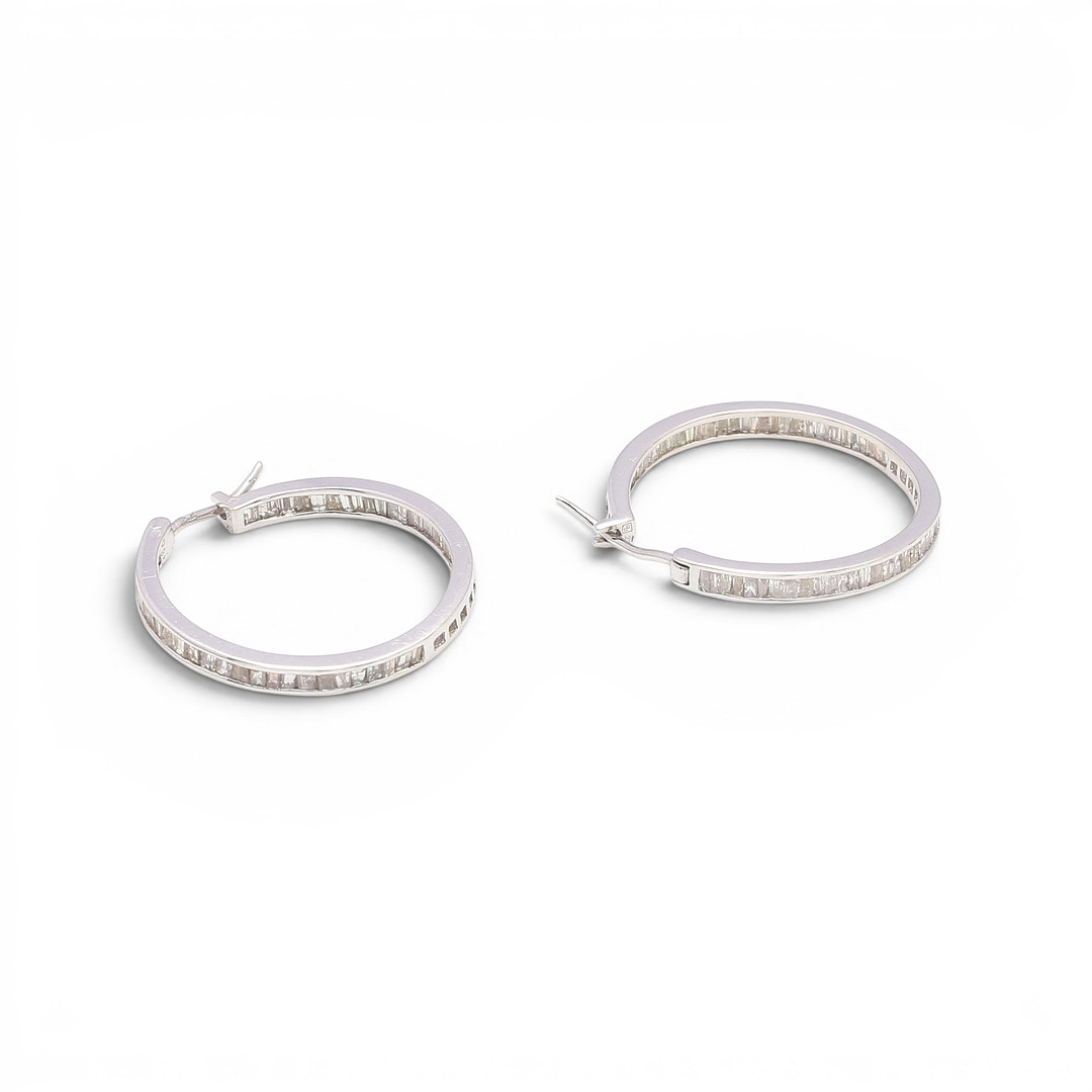 Diamonds creole earrings.