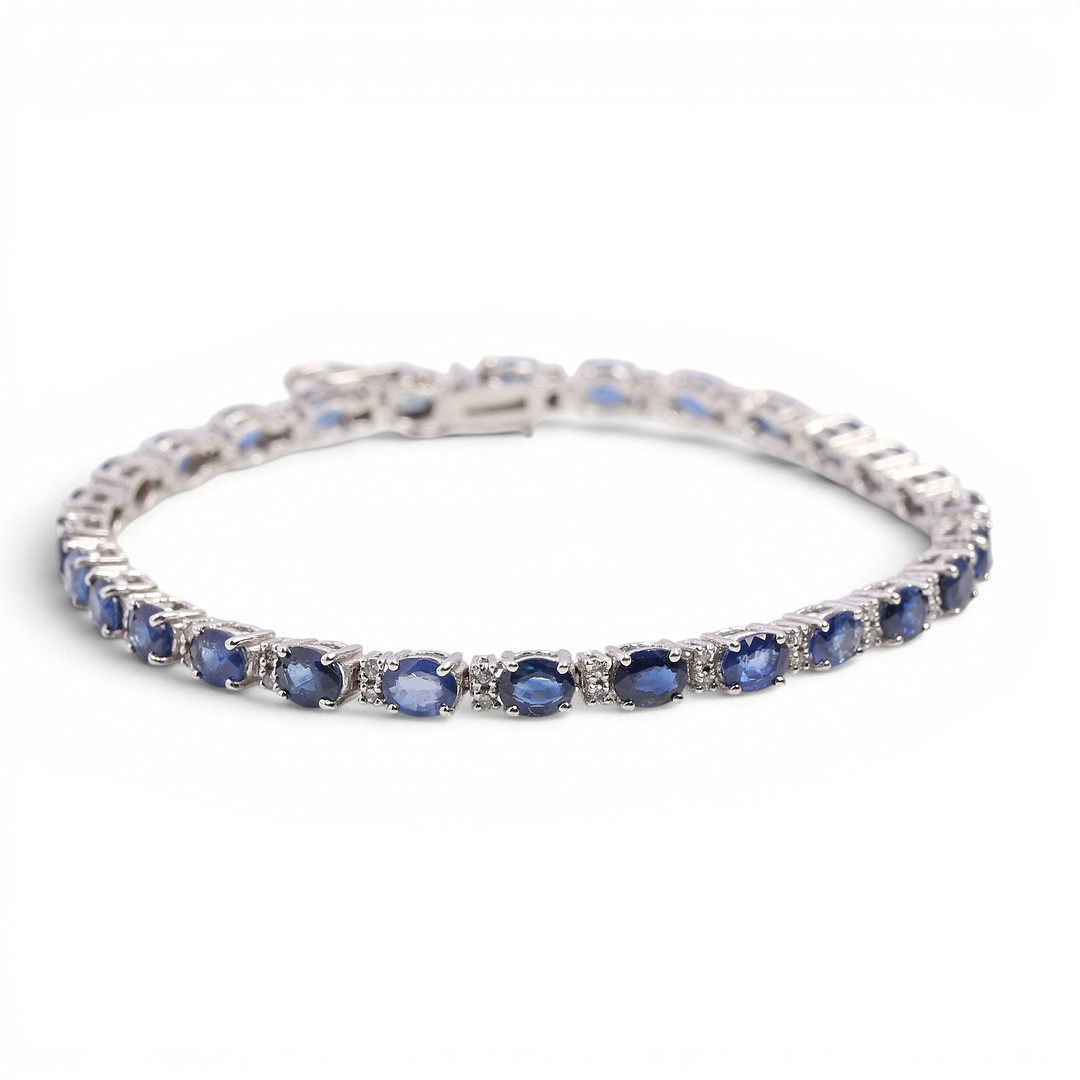 Sapphires and diamonds rivière bracelet.