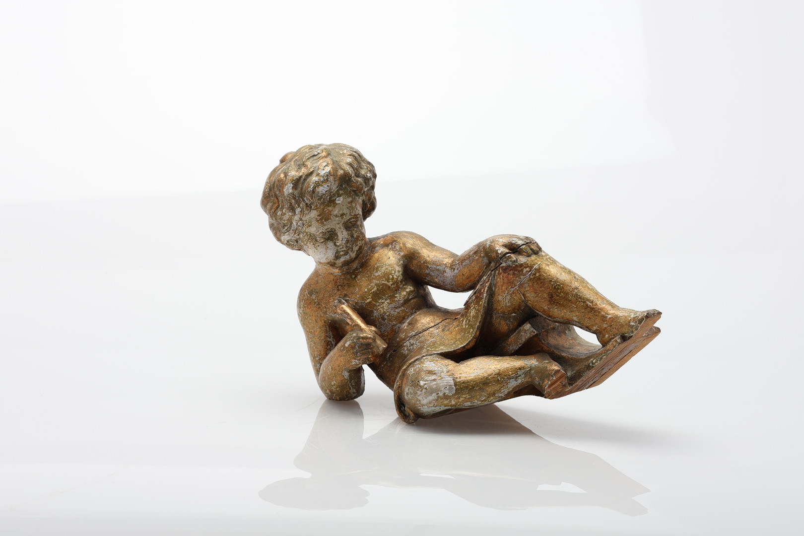 DEKORELEMENT i form av putto, 1800-tal.