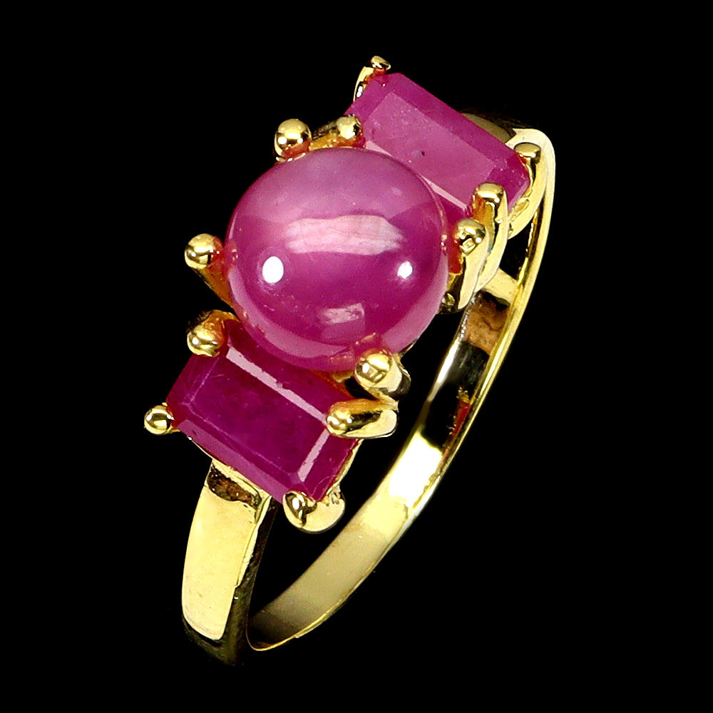 THREE STONE RUBY RING.