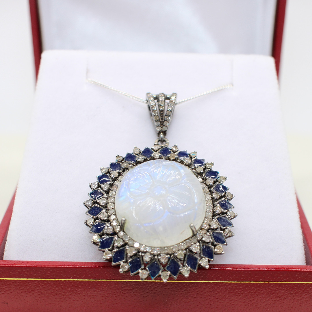 DIAMOND & MOONSTONE PENDANT NECKLACE.