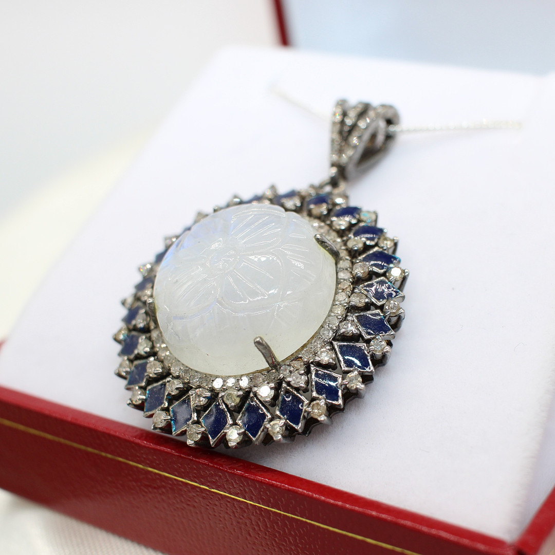 DIAMOND & MOONSTONE PENDANT NECKLACE.