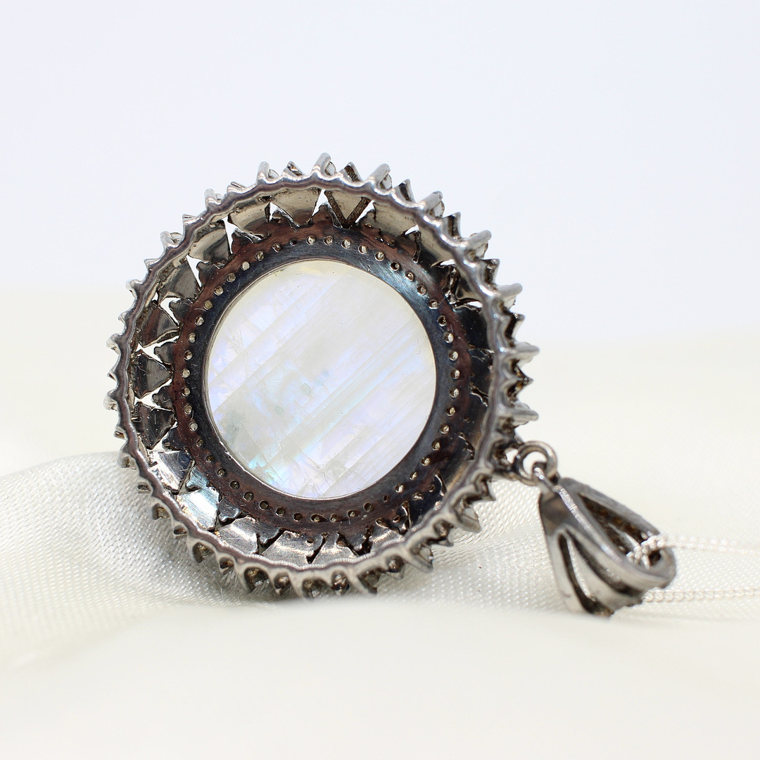 DIAMOND & MOONSTONE PENDANT NECKLACE.
