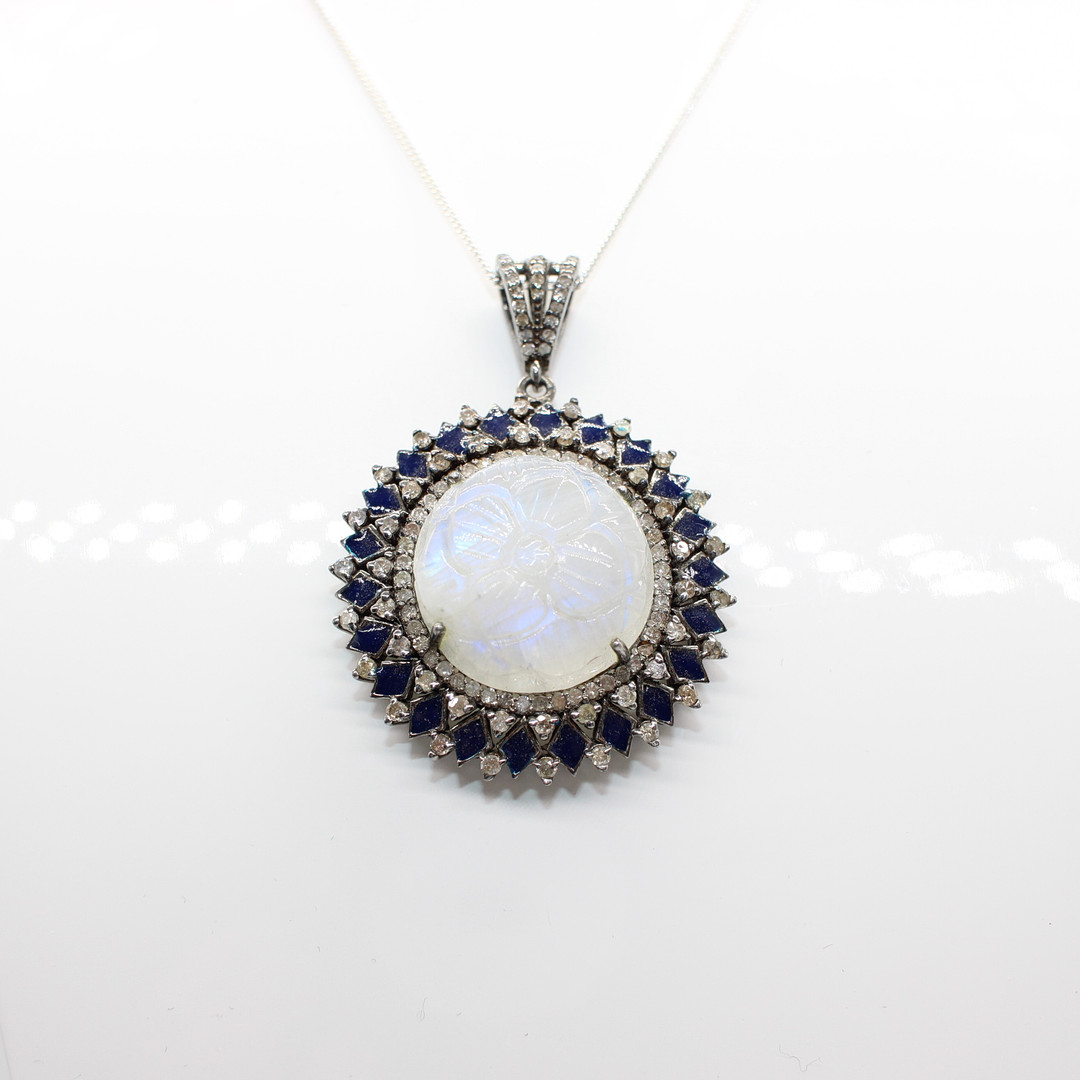 DIAMOND & MOONSTONE PENDANT NECKLACE.
