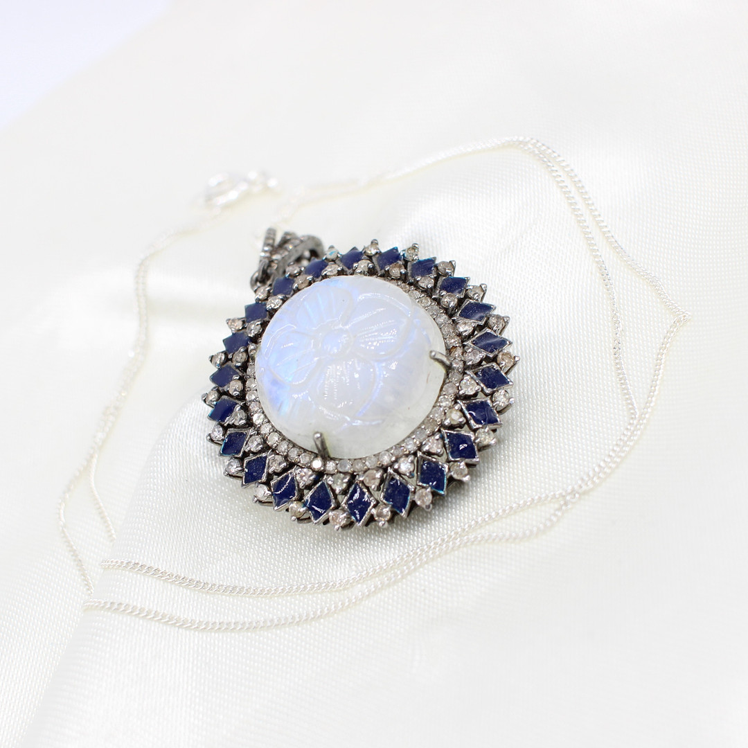 DIAMOND & MOONSTONE PENDANT NECKLACE.
