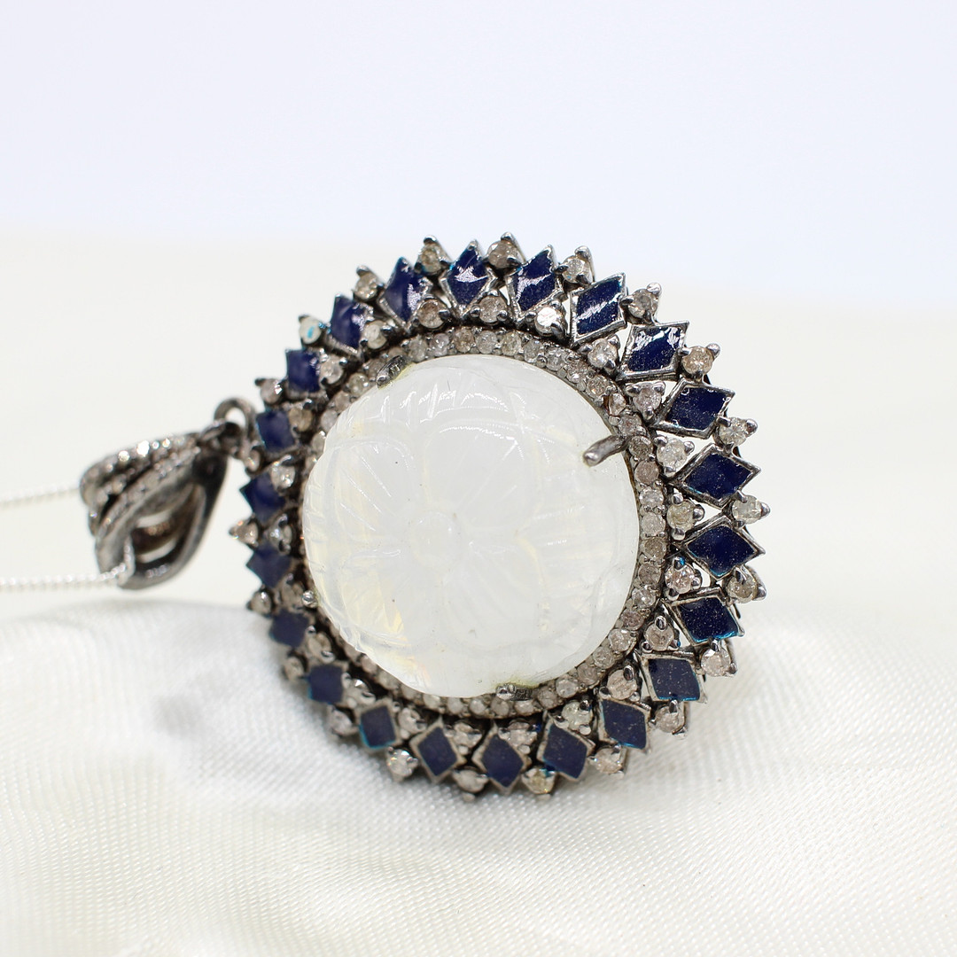 DIAMOND & MOONSTONE PENDANT NECKLACE.
