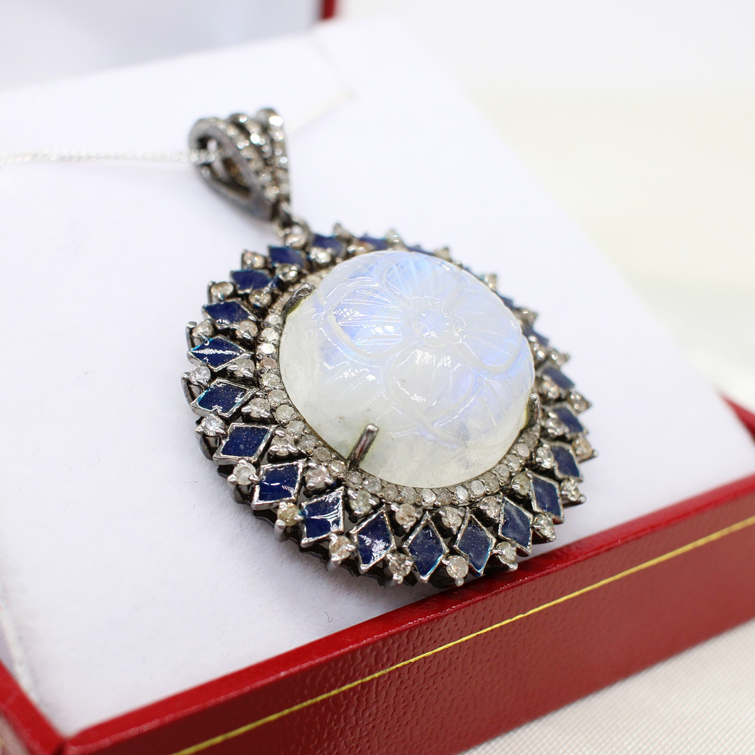 DIAMOND & MOONSTONE PENDANT NECKLACE.