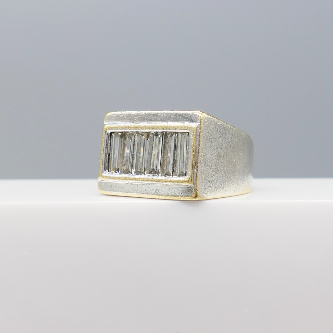 DIAMOND PINKY-STYLE ring.