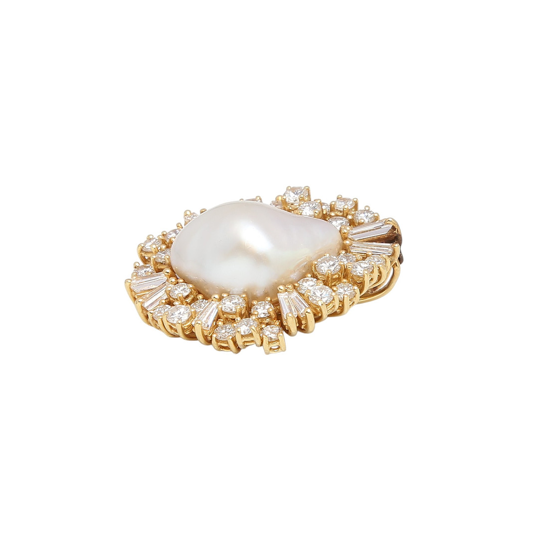 Baroque pearl and diamonds rosette pendant.