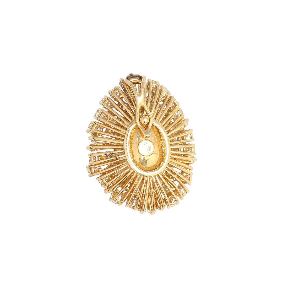 Baroque pearl and diamonds rosette pendant.