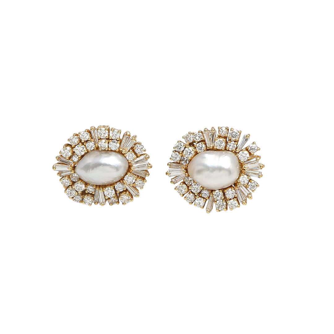Baroque pearl and diamonds rosette earrings.