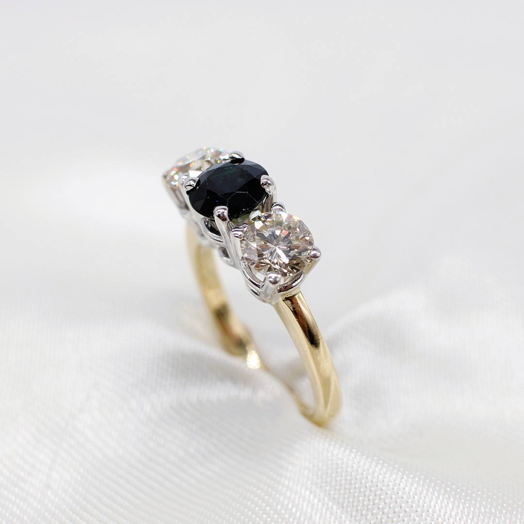 CERTIFIED SAPPHIRE & DIAMOND TRILOGY RING.