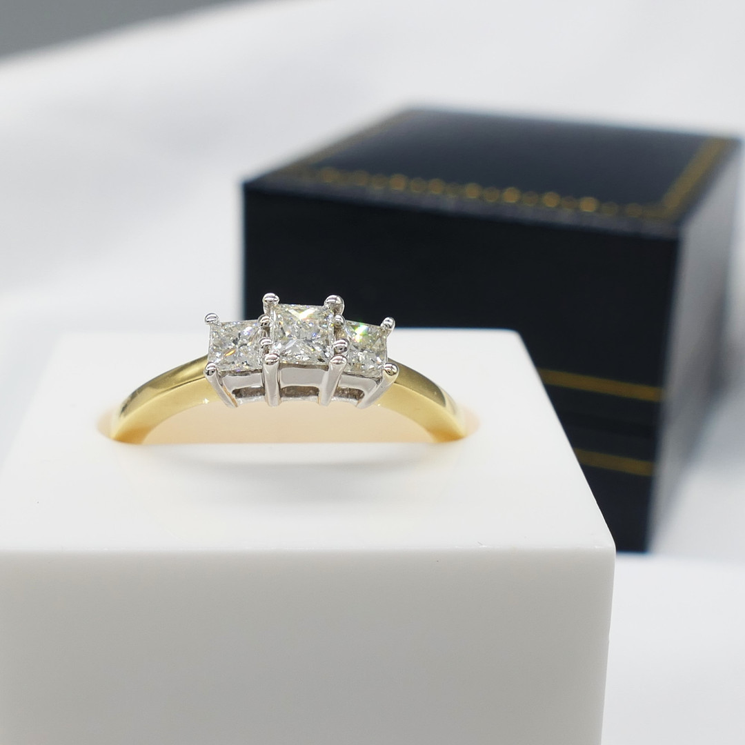 0.50CT PRINCESS CUT DIAMOND ring.